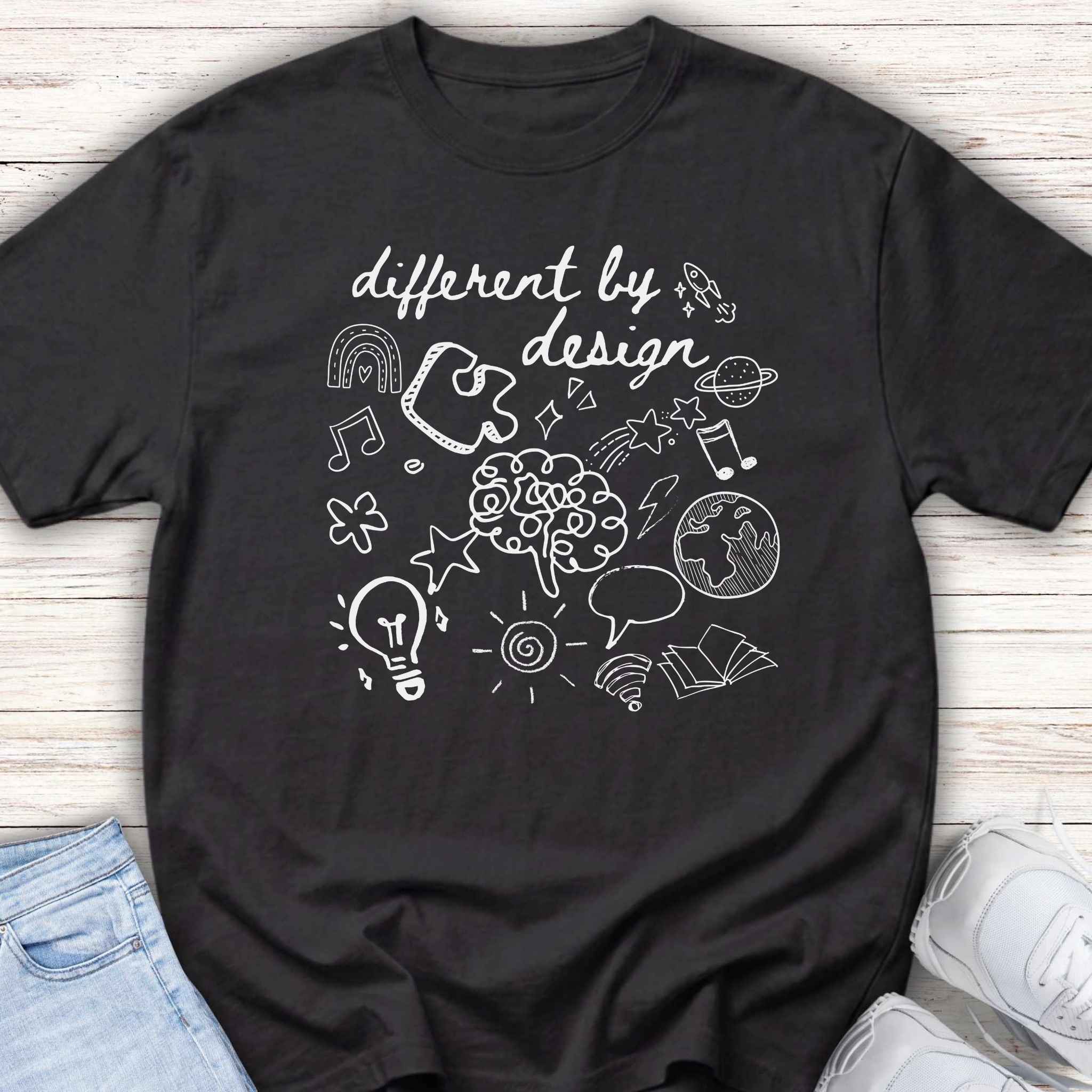 Youth Tee — “Different By Design” Creativity & Neurodiversity Graphic