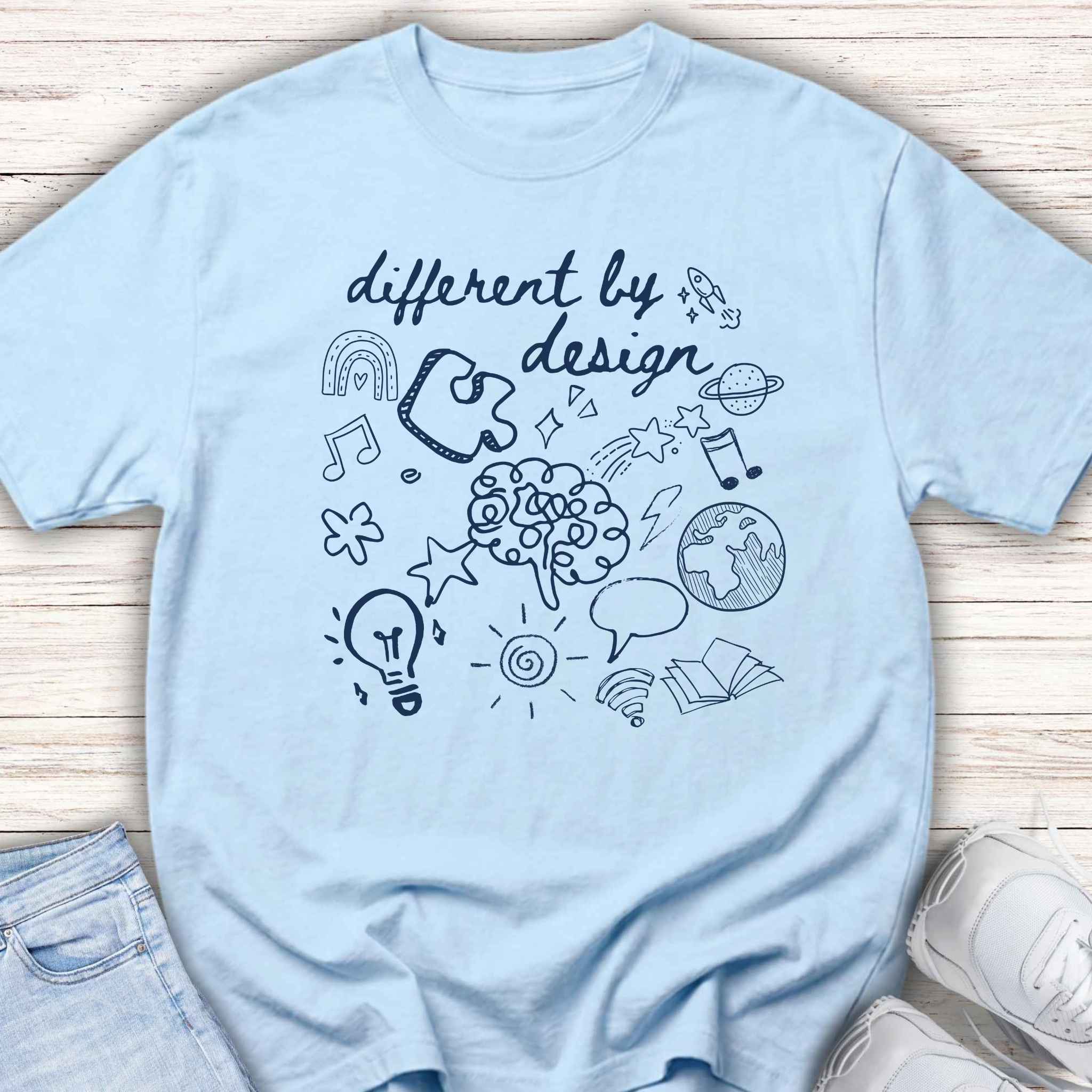 Youth Tee — “Different By Design” Creativity & Neurodiversity Graphic